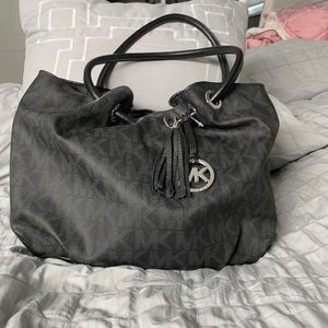 Michael Kors black logo shoulder bag.